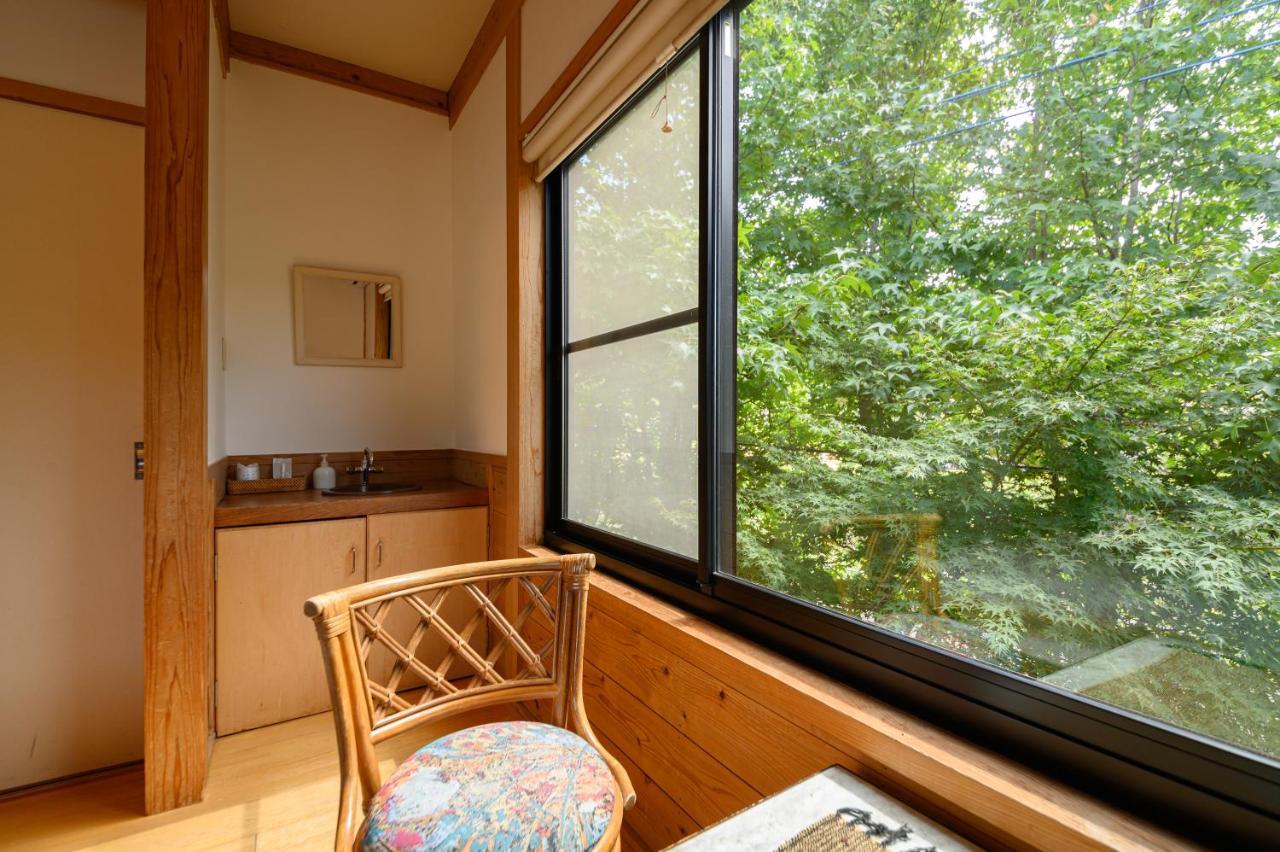 Bed and breakfast Yufuin Flora House Extérieur photo